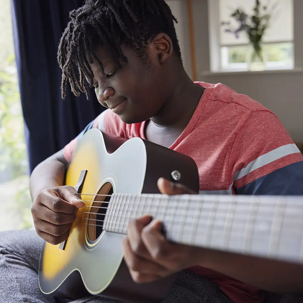 Learn to play guitar with Eskay's Music Lessons in-home and online teachers
