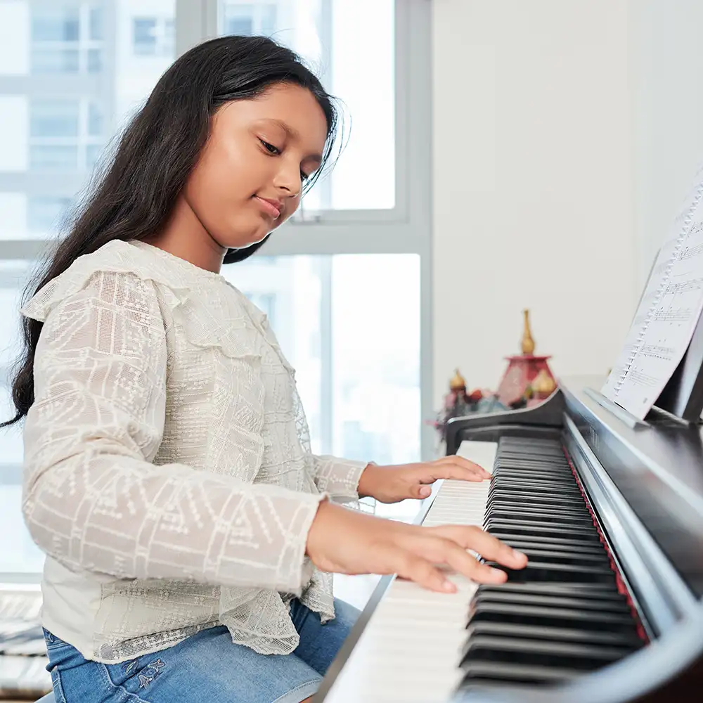 Take piano lessons virtually and in your own home with Eskay's music lessons