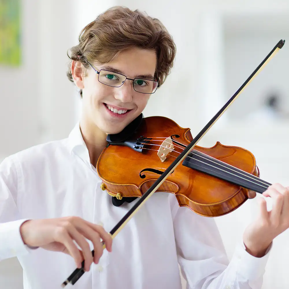 Learn to play the viola in the comfort of your home or online with Eskay's Music Lessons