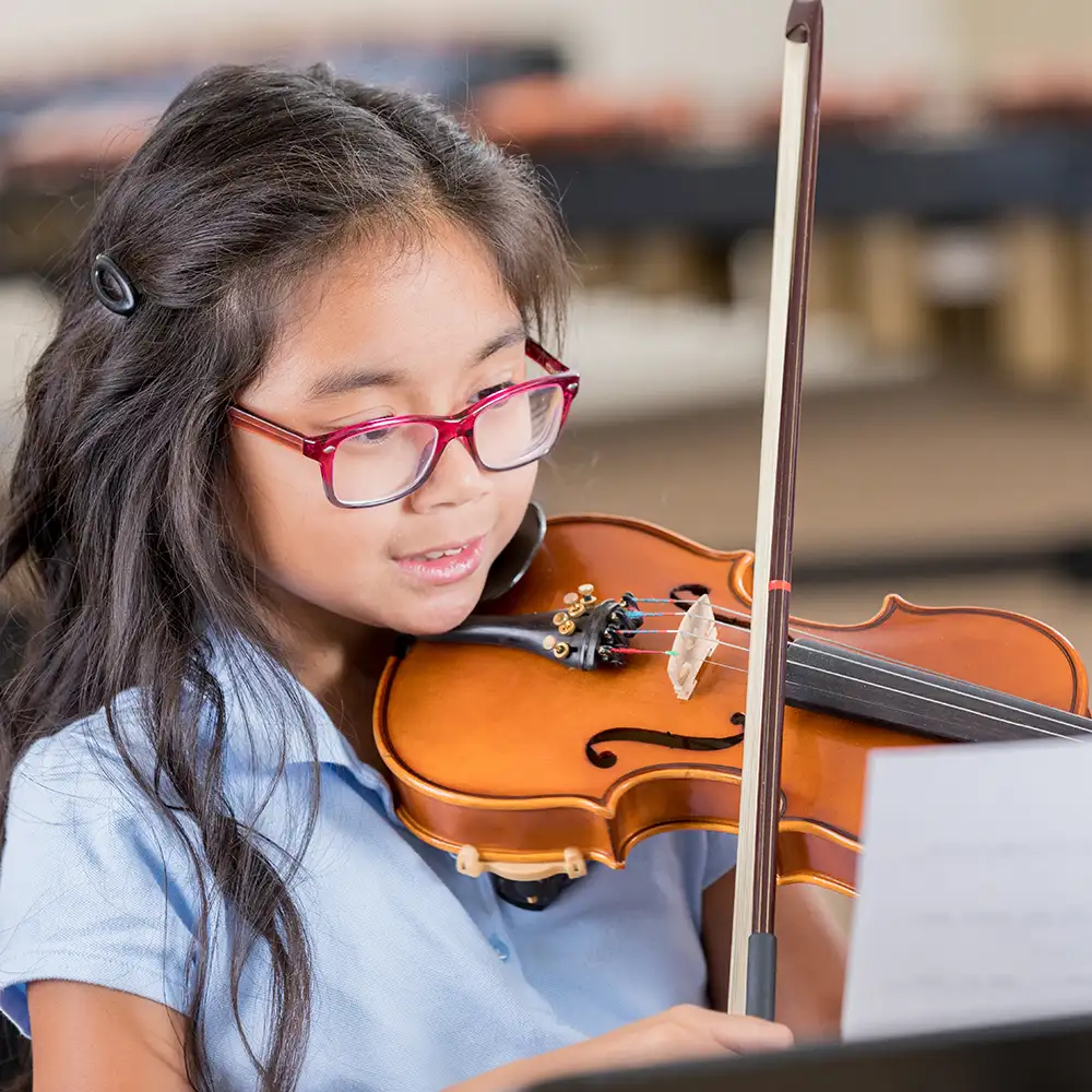 Violin lessons are taught in-home and virtually at Eskay's Music Lessons