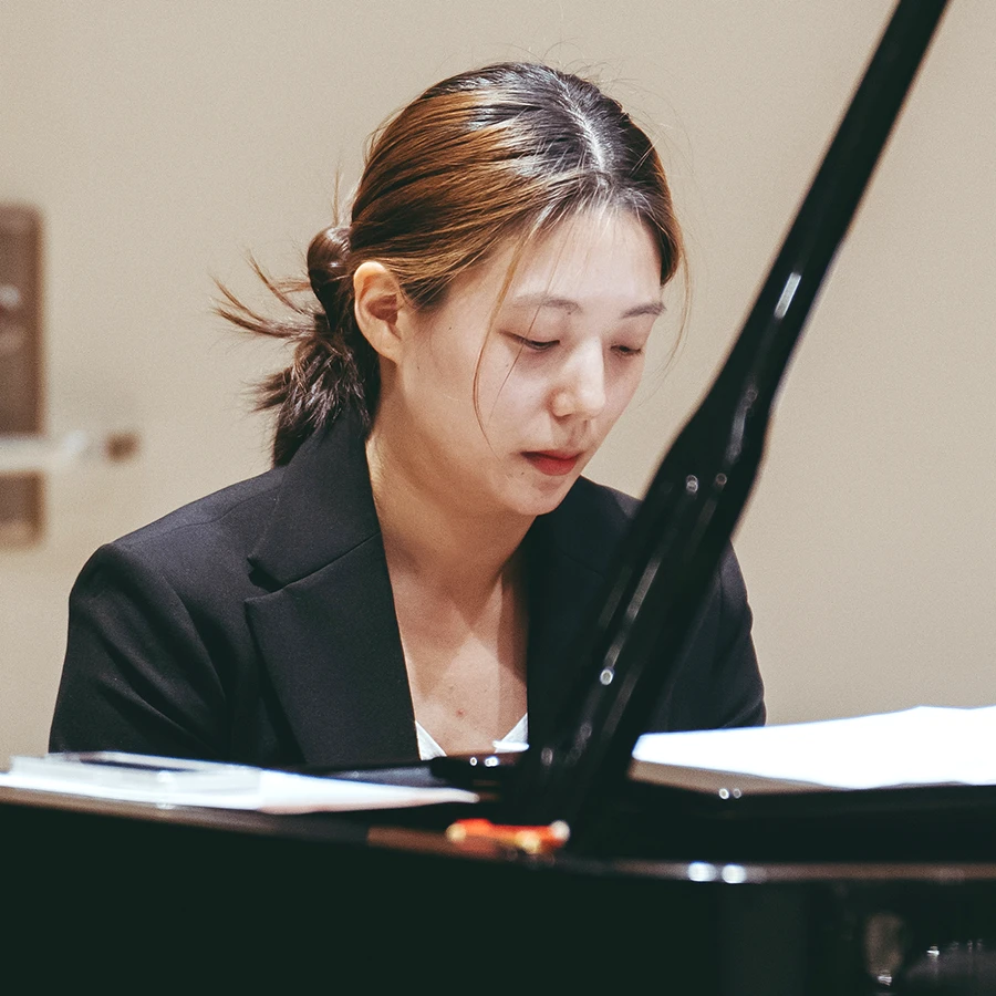 Sung Kim teaches piano for Eskay's Music Lessons